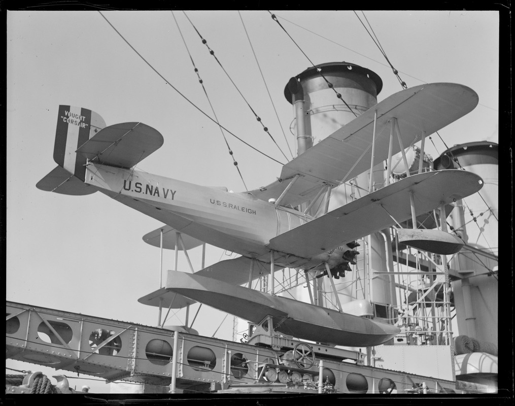 Amphibious plane on catapult aboard the USS Raleigh, at Navy Yard