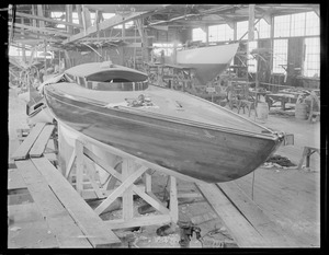 Boats in shed under construction