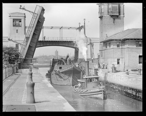 The Arbella being towed past the Leverett street drawbridge by the Wm. G. Williams