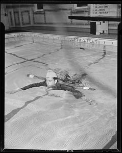 Soldier swimming in McCurdy Natatorium (1942)