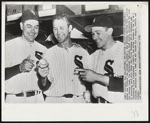 Pitched One-Hitter Against Former Teammates--White Sox Pitcher Joe Dobson (center), who pitches one-hit ball against his former team, the Cleveland Indians, last night, discusses the game in dressing room with White Sox First Baseman Eddie Robinson and Shortstop Chico Carrasquel (right), two other heroes of the 12 to 1 victory. Robinson hit a home run and Chico hit a single, double and triple.