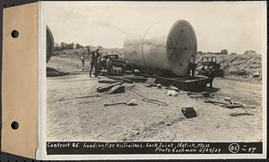 Contract No. 85, Manufacture and Delivery of Precast Concrete Steel Cylinder Pipe, Southborough, Framingham, Wayland, Natick, Weston, loading pipe on trailers, Natick, Mass., May 29, 1939