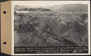 Contract No. 80, High Level Distribution Reservoir, Weston, looking north from center line aqueduct at Sta. 890+80 showing bedrock, high level distribution reservoir, Weston, Mass., Apr. 16, 1940