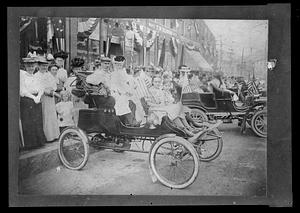 Spectators at a parade, Clark’s block, Main Street