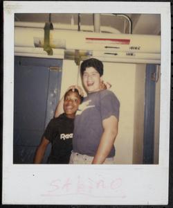 Two boys posing with silly faces
