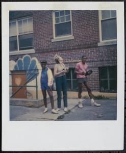 Susan Richards, middle, working on a project with two young people
