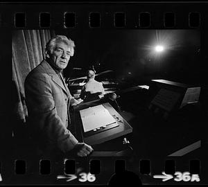 Leonard Bernstein rehearses a speech at Harvard's Sanders Theatre, Cambridge