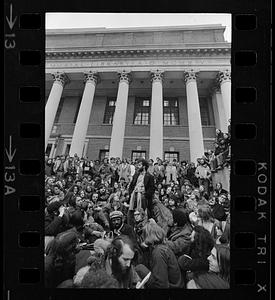 "Yippie" Jerry Rubin and fans on steps of Harvard's Widener Library, Cambridge