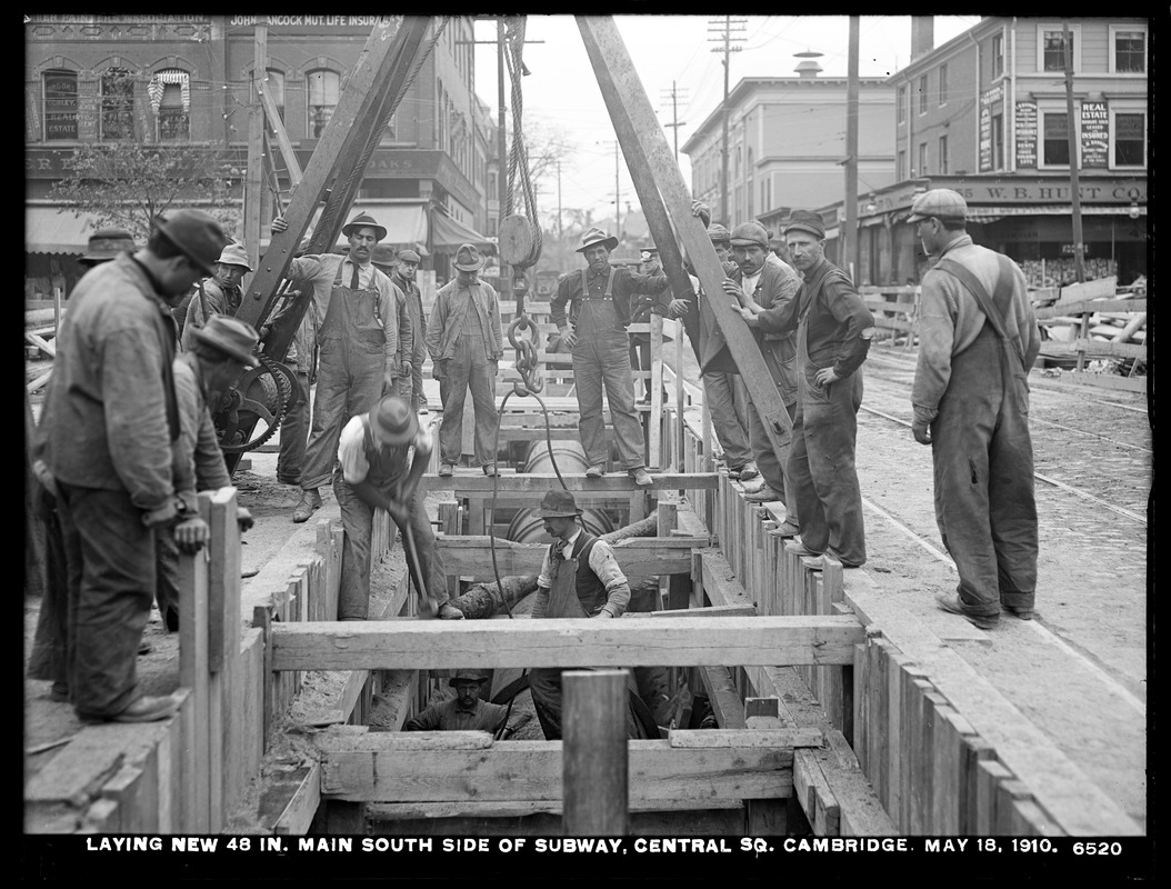 Distribution Department, Low Service Pipe Lines, laying new 48-inch main south side of subway, Central Square, Cambridge, Mass., May 18, 1910