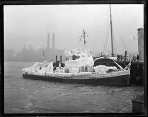 US rum chaser Dallas coated with ice (view from Navy Yard, Charlestown, Lincoln Wharf, background).
