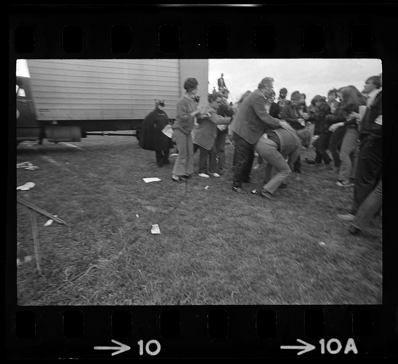 Anti-war rally, Soldiers Field: Counter demonstrator restrained, Allston