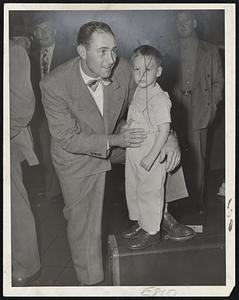 Still Reflect Yesterday's Joy-Sibby Sisti and his three-year-old son Dan smile happily as the Braves leave for a three-game series in Brooklyn.
