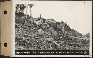 Contract No. 21, Portion of Ware-Belchertown Highway, Ware and Belchertown, ledge at Sta. 144+25 before blasting, Ware and Belchertown, Mass., Aug. 19, 1931