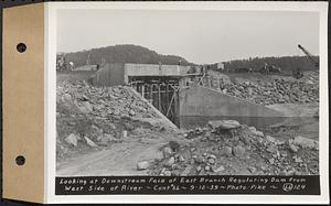 Contract No. 66, Regulating Dams, Middle Branch (New Salem), and East Branch of the Swift River, Hardwick and Petersham (formerly Dana), looking at downstream face of east branch regulating dam from west side of river, Hardwick, Mass., Sep. 12, 1939