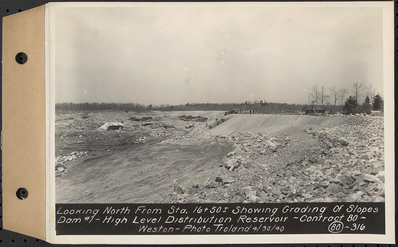 Contract No. 80, High Level Distribution Reservoir, Weston, looking north from Sta. 16+50+/- showing grading of slopes dam 1, high level distribution reservoir, Weston, Mass., Apr. 30, 1940