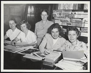 Adding to the Large and Much-Used picture file at the Attleboro public library are (left to right) Janet Bandilli, Jean Faulkner, Lucille Paquette and (standing) head librarian Lucille Cavender.