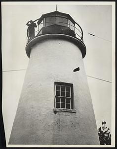 Woman Lighthouse Keeper Serves Coast Guard on Chesapeake Bay. The only woman lighthouse keeper in the Coast Guard service, Mrs. Fanny May Salters goes topside at the Turkey Point light, near Baltimore, on Chesapeake Bay, for her daily checkup of the great beacon. On her vigilant watch for the past 20 years, the safety of mariners moving up the bay has depended. Before he died in 1925, her husband served Turkey Point Light with Mrs. Salters as his assistant. When not busy with the light, Mrs. Salters devotes herself to her hobbies... a three acre garden plot and cross word puzzles.