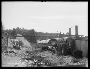 Weston Aqueduct, Section 9, hauling steel pipe up incline, east of road, Wayland, Mass., Aug. 7, 1902