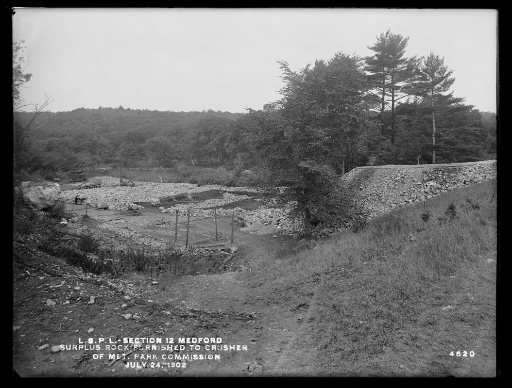 Distribution Department, Low Service Pipe Lines, Section 12, surplus rock furnished to crusher of Metropolitan Park Commission, Medford, Mass., Jul. 24, 1902