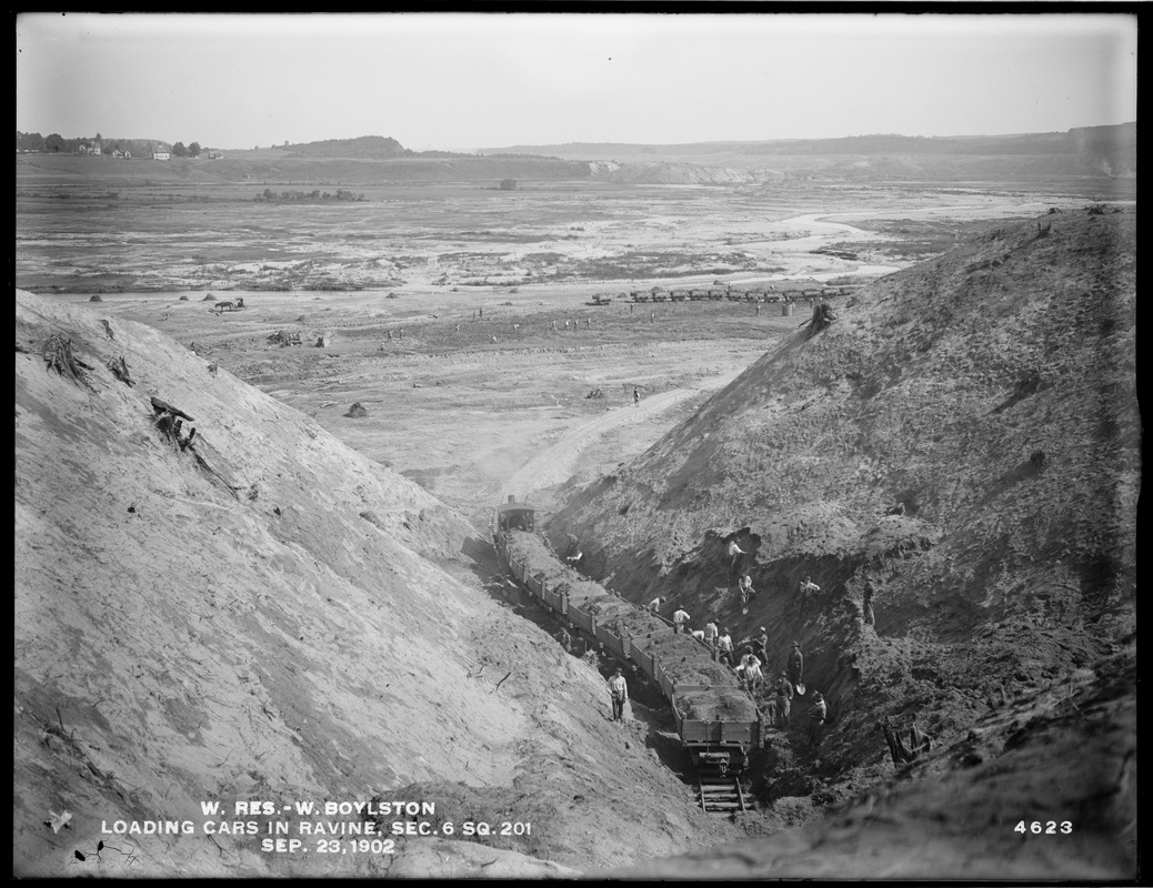 Wachusett Reservoir, loading cars in ravine, Section 6, square 201, West Boylston, Mass., Sep. 23, 1902