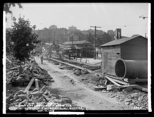 Distribution Department, supply pipe lines, Section 4, Commonwealth Avenue, excavating 48-inch pipe trench with traveling machine, Boston, Mass., Sep. 15, 1902