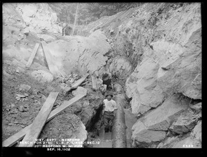 Distribution Department, Low Service Pipe Lines, Section 12, trench for two 60-inch pipe lines, 20-inch Medford Water Works pipe, Medford, Mass., Sep. 16, 1902