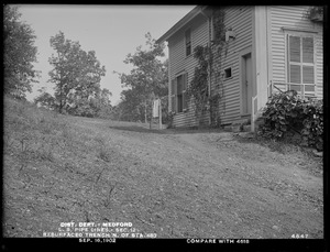 Distribution Department, Low Service Pipe Lines, Section 12, resurfaced trench north of station 483, rear of Wright's house near Forest Street (compare with No. 4518), Medford, Mass., Sep. 16, 1902