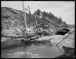 Wachusett Dam, high water, looking downstream through gap in dam, Clinton, Mass., Oct. 29, 1902