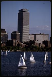 Prudential building and sailboats on Charles River Basin, Boston