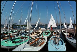 Sailboats ready for hire at boathouse, Charles River Basin, Boston