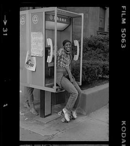 Roller skater phone caller on Boylston Street, Boston