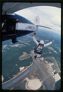 Parachutist jumps from plane at Jumptown, Orange
