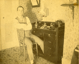 Charles Eugene Monroe at his engraving table in his jewelry and watch store in the old YMCA building Southbridge Massachusetts