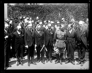 Calvin Coolidge stands with Captain Köhl of Germany and the owner of the Bremer, Baron von Hunefeld and Captain Fitzmaurice of Ireland, who he presented with the Distinguished Flying Cross at the White House, May 2, 1928