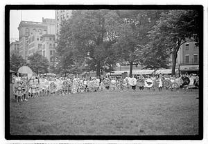 Group holding circular emblems