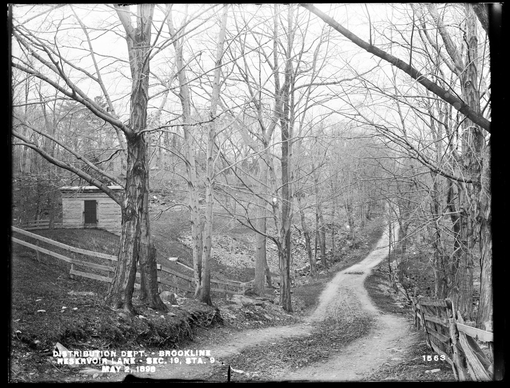 Distribution Department, Southern High Service Pipe Line, Section 19, Reservoir Lane, station 9, from the southeast; Webber's Waste Weir (Cochituate Aqueduct), in middle ground, left, Brookline, Mass., May 2, 1898