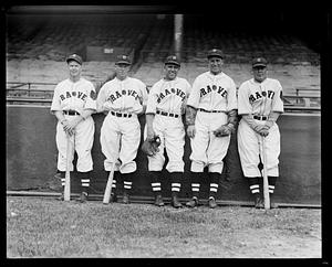 Five Boston Braves players pose next to stands