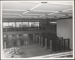 Construction of Boylston Building, Boston Public Library, shelving installed on first floor and Mezzanine
