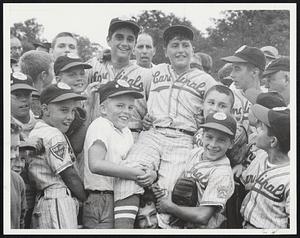 Winners Ride High-Shortstop Pete DiDomenico (left) and pitcher Don Colantonio flash smiles after leading Newton North to 4-3 victory over Stoughton for state Little League championship at Braintree yesterday.