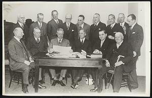 National League Leaders Meet to Ratify Schedule. Members of the National League met in New York, Feb. 3, to ratify the schedule for the forthcoming baseball season. They are shown left to right, seated: L.C. Ruch, Philadelphia, Charles Stoneham, New York, John A Heydler, president of the League, Sam Breadon, St. Louis, Emil Fuchs, Boston, Steve McKeever, Brooklyn and standing, left to right: L.C. Widrig, Cincinnati, G.P. Nugent, Philadelphia, William Veeck, Chicago, F.B. York, Brooklyn, Sidney Weil, Cincinnati, Jim Tierney, New York, James Gillandeau, Brooklyn, Cullen Cain and Harvey Traband, secretaries to the League.