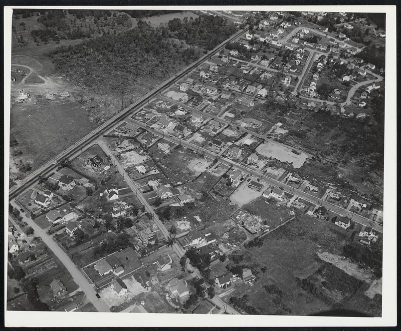 Aerial photo of area damaged by tornado, possibly Shrewsbury, Massachusetts