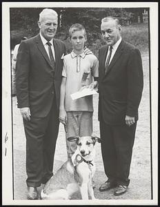 Prince, half German shepherd, half St. Bernard, won the best mixed breed class in the Pet Show held in conjunction with the Fishing Rodeo. He was entered by Bill Fitzgerald (center) of Jamaica Plain. With Bill are Parks Supt. Pat Ryan (left) and J. Robert McLean of the MSPCA.