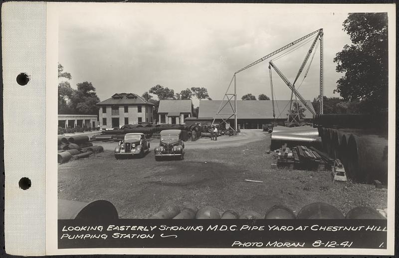 Views of Dane Property, Chestnut Hill Site, Newton Cemetery Site, Boston College Site, looking easterly showing MDC pipe yard at Chestnut Hill pumping station, Chestnut Hill, Brookline, Mass., Aug. 12, 1941
