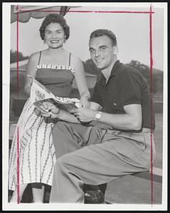 Seixas, Say Hey-Philadelphia net star Vic Seixas, who is competing at the Longwood Cricket Club in National doubles tournament, takes a breather to chat with his attractive wife.