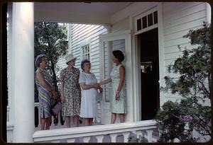 Women greeting each other on the bicentennial house tour
