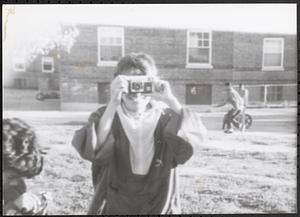 Girl taking a photograph