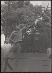 Donovan Thomas and Omo Moses playing basketball