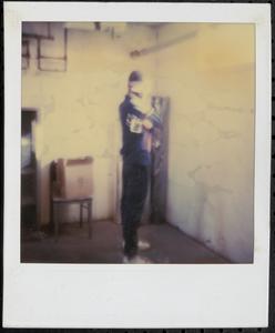 Young person facing the wall