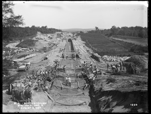 Wachusett Aqueduct, invert, sidewalls and finished aqueduct, Section 6, station 257+, from the south, in road, Northborough, Mass., Aug. 6, 1897