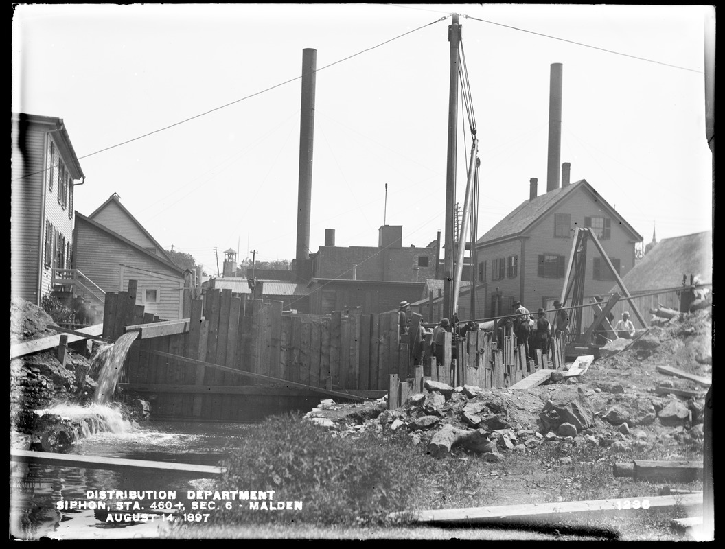 Distribution Department, Low Service Pipe Lines, Section 6, siphon under Spot Pond Brook, station 460+, Jackson Street, from the west, Malden, Mass., Aug. 14, 1897